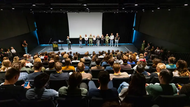 Zaal vol stagiairs