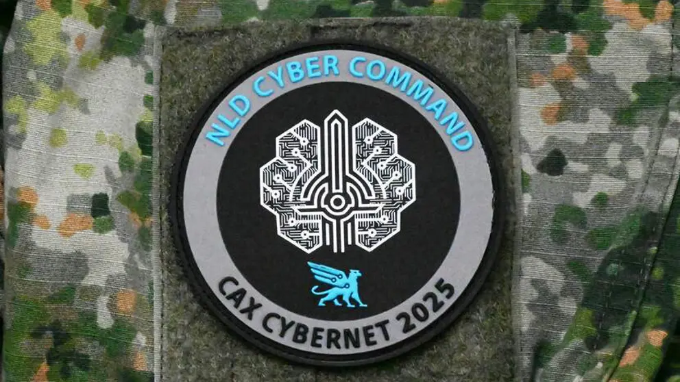 rond insigne van CAX CyberNet 2025.