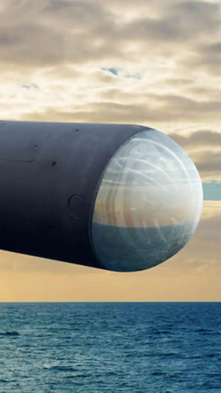 Artist-impression van een Hellfire-raket in de lucht.