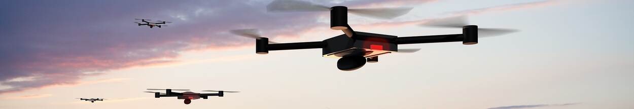 Zwerm drones in de lucht.