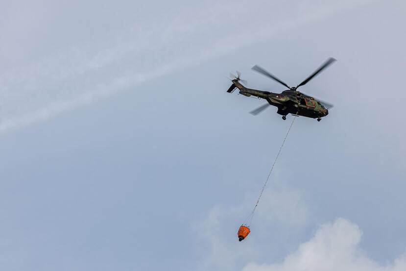 Archieffoto van een Cougar met bambi bucket.