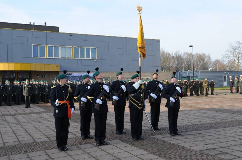 Commando's opgesteld in uniform.